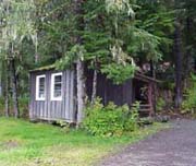 One of the rustic campground cabins located at Log Cabin Resort.