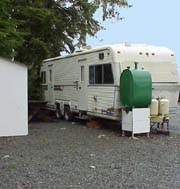 An RV park guest with an unobstructed view of the water and campground marina. 